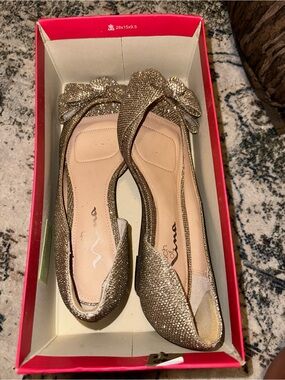Nina Gold Pointed-Toe Flats with Bow Accent
